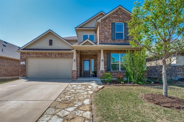 11812 Patton Dr, Frisco, TX 75036 - view of front of property featuring brick siding, concrete driveway, an attached garage, and a front yard