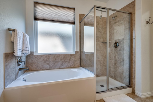 11812 Patton Dr, Frisco, TX 75036 - full bathroom featuring plenty of natural light, a shower stall, and a garden tub