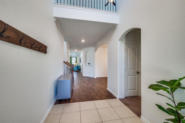 11812 Patton Dr, Frisco, TX 75036 - hall with arched walkways, baseboards, stairway, recessed lighting, and wood finished floors