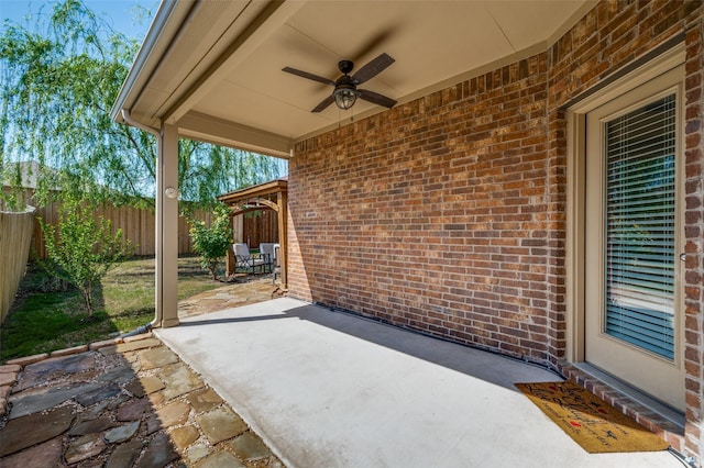 11812 Patton Dr, Frisco, TX 75036 - fenced backyard featuring ceiling fan and a patio area