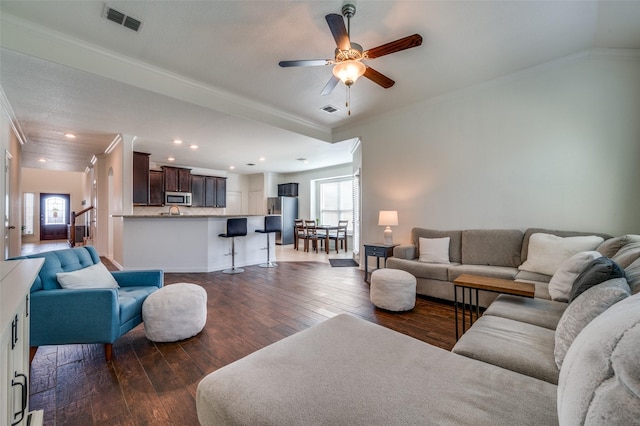 11812 Patton Dr, Frisco, TX 75036 - living room featuring ornamental molding, dark wood finished floors, ceiling fan, and recessed lighting