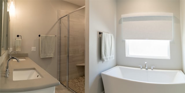 4721 Dry Creek Rd, Sherman, TX 75092 - full bath with a freestanding bath, a stall shower, double vanity, and tile patterned flooring