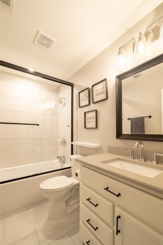 4721 Dry Creek Rd, Sherman, TX 75092 - full bath featuring vanity, toilet, shower / bath combination with glass door, and tile patterned floors