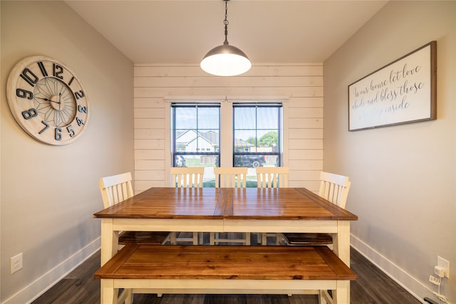 4721 Dry Creek Rd, Sherman, TX 75092 - dining space with dark wood-style floors, baseboards, and wooden walls