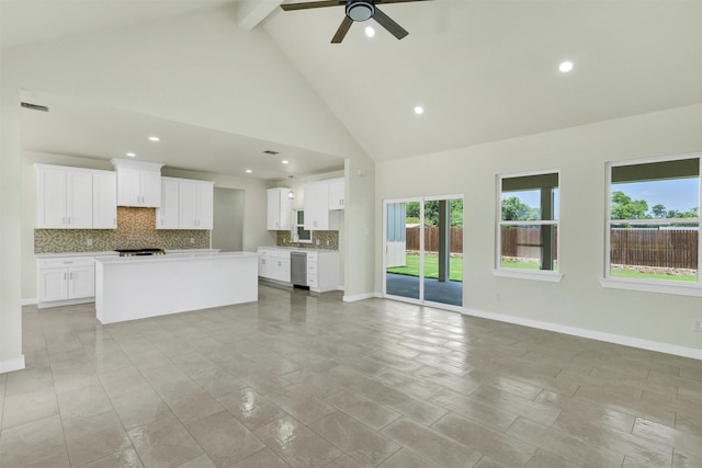 548 Highview Ct, Godley, TX 76044 - unfurnished living room with a ceiling fan, recessed lighting, beamed ceiling, high vaulted ceiling, and baseboards