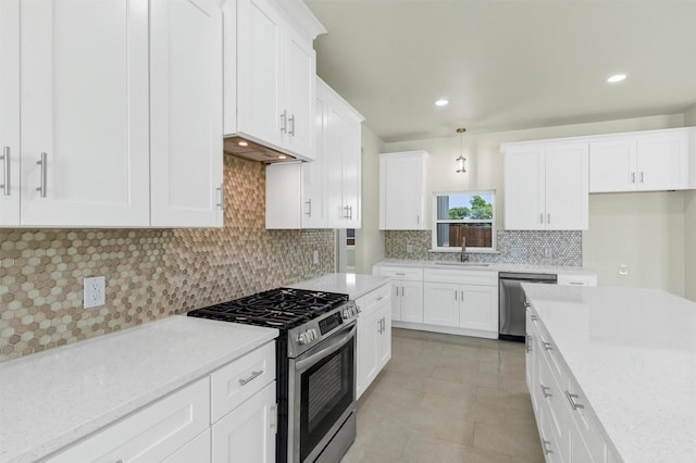 548 Highview Ct, Godley, TX 76044 - kitchen with appliances with stainless steel finishes, a sink, white cabinets, decorative backsplash, and recessed lighting
