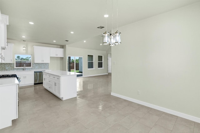 548 Highview Ct, Godley, TX 76044 - kitchen featuring appliances with stainless steel finishes, a sink, decorative backsplash, recessed lighting, and a kitchen island