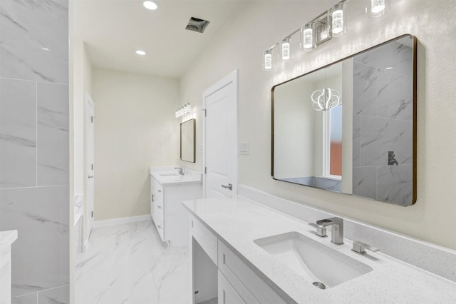 548 Highview Ct, Godley, TX 76044 - full bathroom featuring two vanities, marble finish floors, and recessed lighting