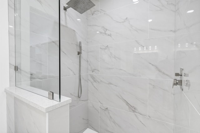 548 Highview Ct, Godley, TX 76044 - bathroom featuring a marble finish shower