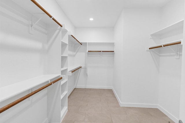 548 Highview Ct, Godley, TX 76044 - walk in closet featuring light tile patterned floors