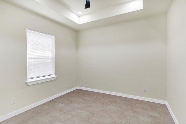 548 Highview Ct, Godley, TX 76044 - empty room featuring light tile patterned flooring, baseboards, recessed lighting, and a tray ceiling