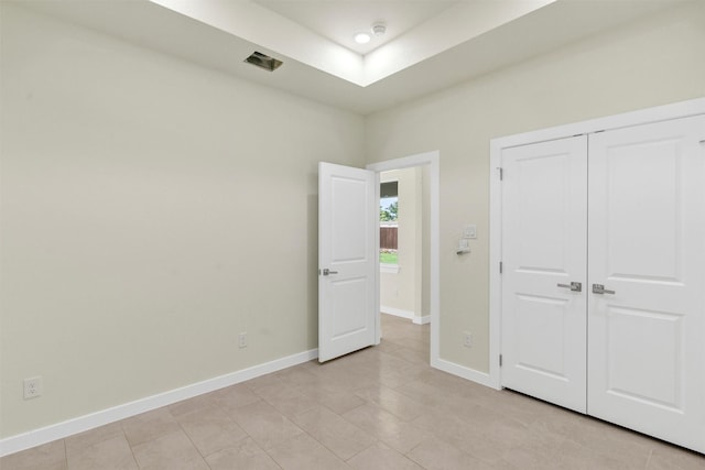 548 Highview Ct, Godley, TX 76044 - unfurnished bedroom with baseboards, light tile patterned flooring, and a closet