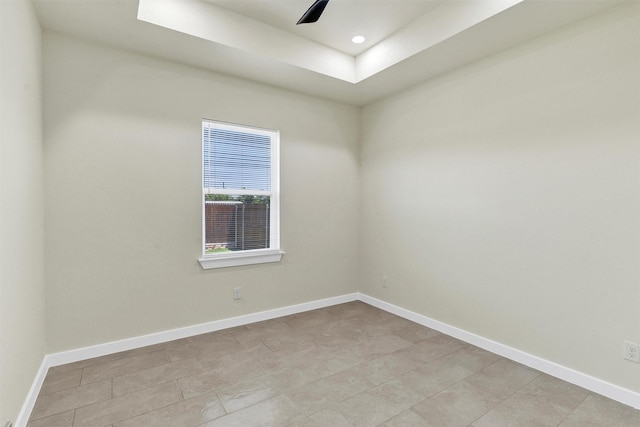 548 Highview Ct, Godley, TX 76044 - spare room featuring baseboards, a tray ceiling, light tile patterned floors, and recessed lighting
