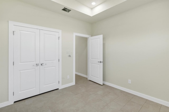 548 Highview Ct, Godley, TX 76044 - unfurnished bedroom featuring baseboards, a closet, and light tile patterned floors