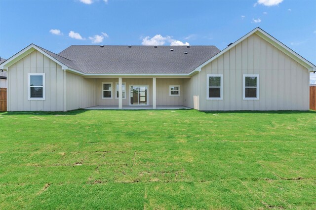 548 Highview Ct, Godley, TX 76044 - rear view of house featuring board and batten siding, a patio area, and a shingled roof