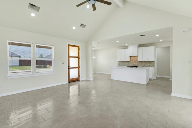 548 Highview Ct, Godley, TX 76044 - unfurnished living room with ceiling fan, beam ceiling, recessed lighting, baseboards, and high vaulted ceiling