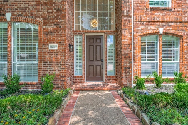 6637 Oakmont Ct, Plano, TX 75093 - view of exterior entry featuring brick siding