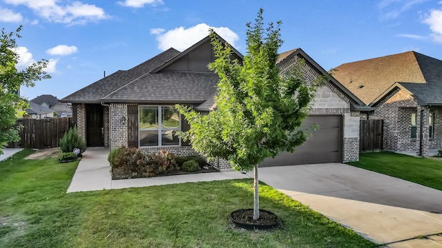353 Paloma St, Weatherford, TX 76087 - view of front of property featuring an attached garage, brick siding, a shingled roof, and driveway