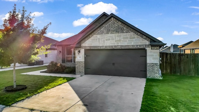 353 Paloma St, Weatherford, TX 76087 - view of front of home with brick siding, a garage, and driveway