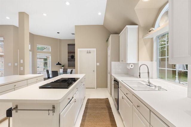 110 San Mateo Ct, Allen, TX 75013 - kitchen with stovetop with downdraft, a sink, a center island, plenty of natural light, and recessed lighting