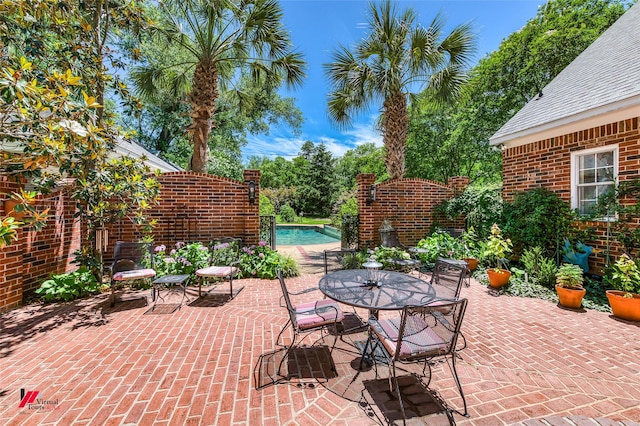 3909 Creswell Ave, Shreveport, LA 71106 - view of patio featuring an outdoor pool