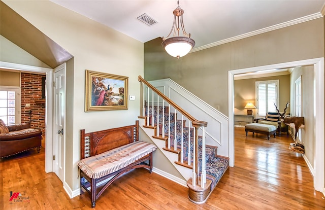 3909 Creswell Ave, Shreveport, LA 71106 - staircase featuring wood finished floors, baseboards, and crown molding