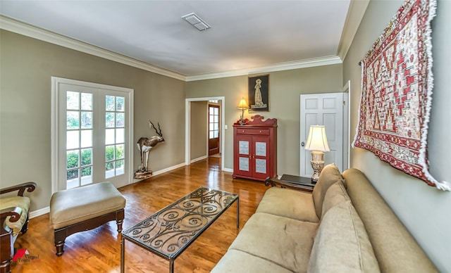 3909 Creswell Ave, Shreveport, LA 71106 - living area featuring ornamental molding, wood finished floors, and baseboards