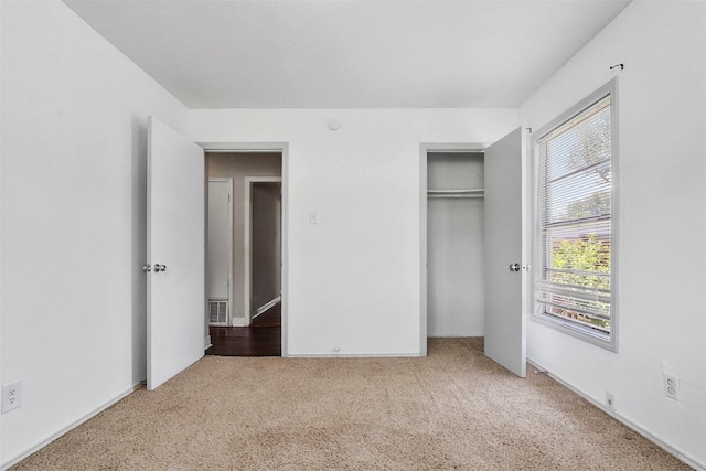 11022 Desdemona Dr, Dallas, TX 75228 - unfurnished bedroom with carpet flooring, a closet, and baseboards