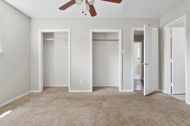 11022 Desdemona Dr, Dallas, TX 75228 - unfurnished bedroom featuring two closets, carpet floors, ceiling fan, and baseboards