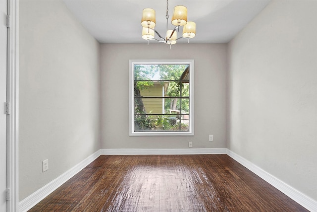 11022 Desdemona Dr, Dallas, TX 75228 - unfurnished room featuring a chandelier, dark wood-type flooring, and baseboards
