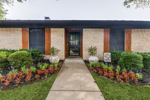 4937 Willowhaven Cir, Garland, TX 75043 - view of exterior entry with brick siding