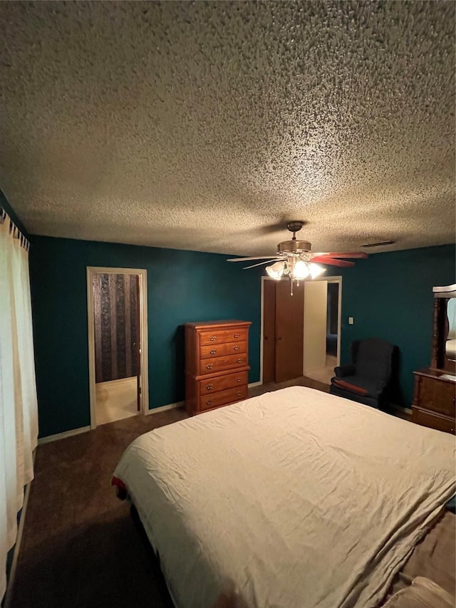 6320 Bocage Dr, Shreveport, LA 71119 - carpeted bedroom with a textured ceiling and a ceiling fan