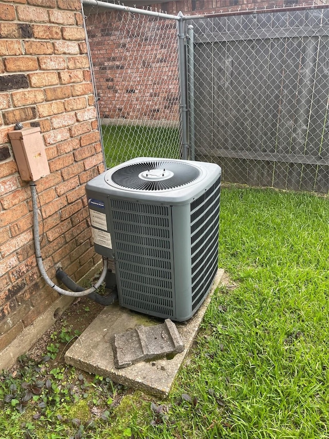 6320 Bocage Dr, Shreveport, LA 71119 - exterior view of central AC and brick siding