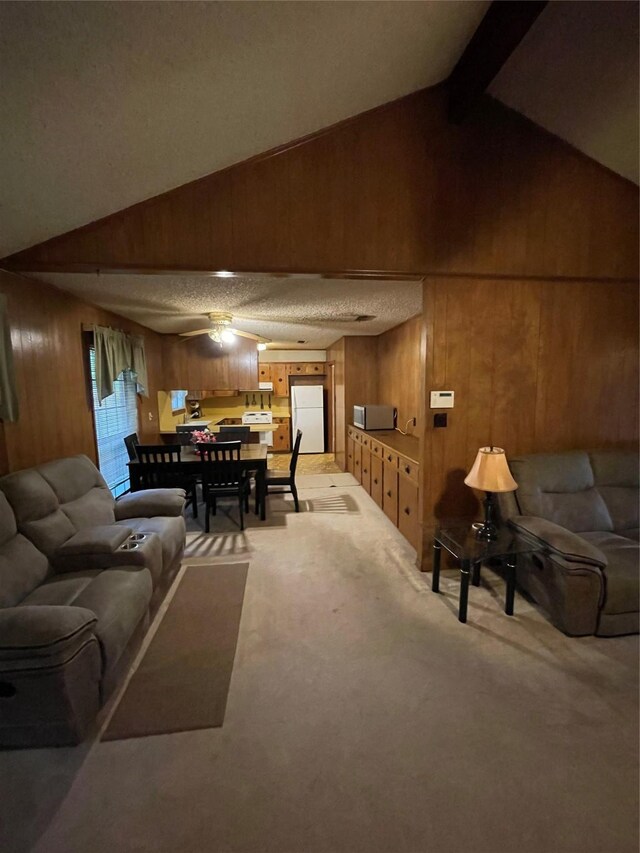 6320 Bocage Dr, Shreveport, LA 71119 - living room featuring wooden walls, light carpet, and ceiling fan