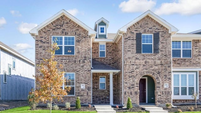 3701 Star Mesa Unit 14, Heartland, TX 75114 - view of front of property with brick siding