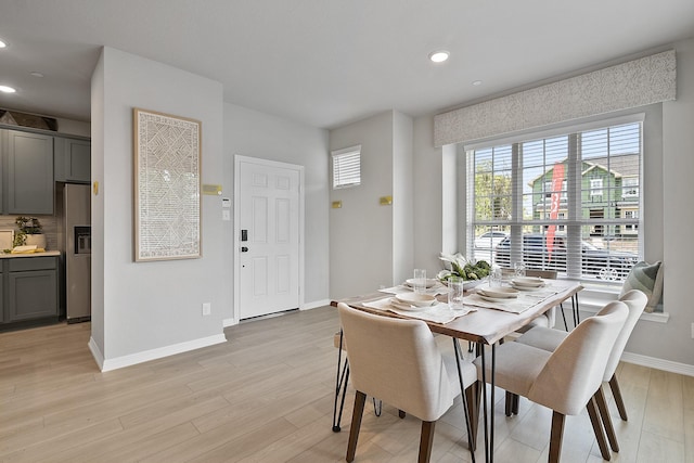 3701 Star Mesa Unit 14, Heartland, TX 75114 - dining area featuring healthy amount of natural light, baseboards, light wood-type flooring, and recessed lighting
