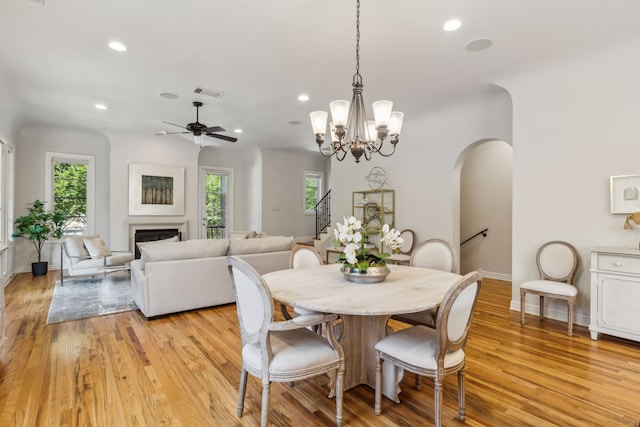 275 Casa Blanca Ave, Fort Worth, TX 76107 - dining area with stairway, arched walkways, ceiling fan, light wood finished floors, and recessed lighting