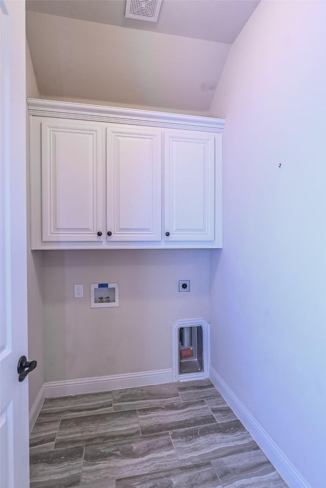 2230 Lewis Canyon Dr, Prosper, TX 75078 - laundry room featuring hookup for an electric dryer, cabinet space, hookup for a washing machine, and baseboards