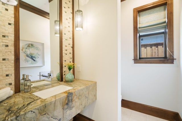 6807 Orchid Ln, Dallas, TX 75230 - bathroom with vanity, baseboards, and tile patterned floors