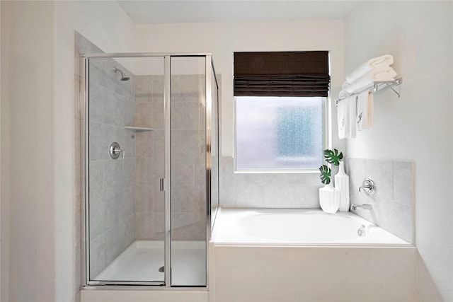 911 Bluewood St, Princeton, TX 75407 - full bath featuring a garden tub and a shower stall