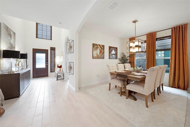 911 Bluewood St, Princeton, TX 75407 - dining room with arched walkways and baseboards