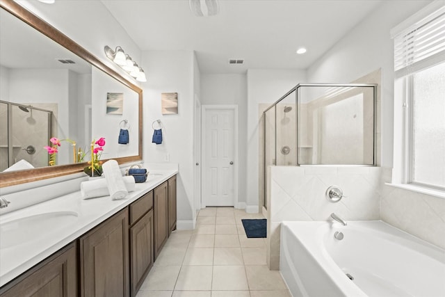 5653 Salt Springs Dr, Fort Worth, TX 76179 - bathroom with double vanity, a garden tub, a shower stall, and healthy amount of natural light
