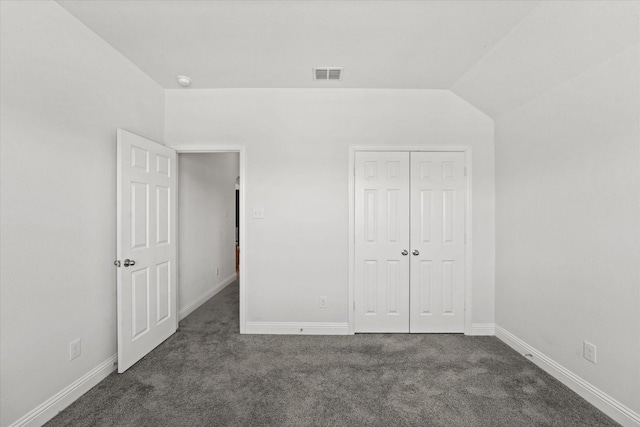 5653 Salt Springs Dr, Fort Worth, TX 76179 - unfurnished bedroom featuring dark carpet, a closet, baseboards, and lofted ceiling