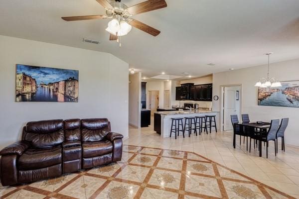 1300 Woodbine Cliff Dr, Fort Worth, TX 76179 - living area with a chandelier, a ceiling fan, and recessed lighting