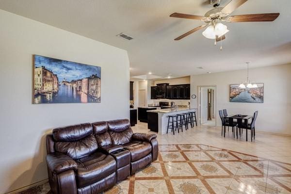 1300 Woodbine Cliff Dr, Fort Worth, TX 76179 - living area featuring a chandelier, ceiling fan, and recessed lighting