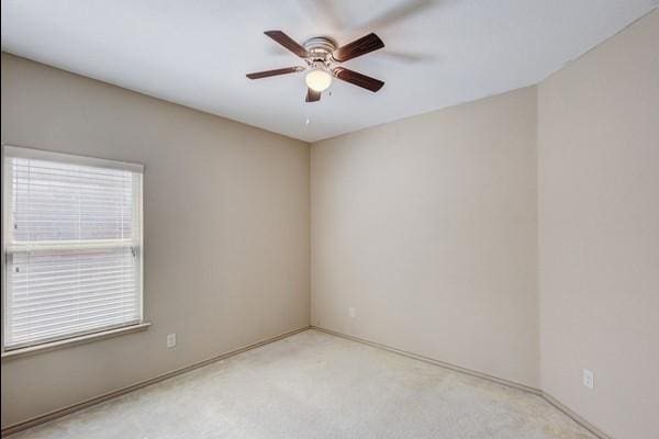 1300 Woodbine Cliff Dr, Fort Worth, TX 76179 - spare room with ceiling fan, carpet flooring, and baseboards