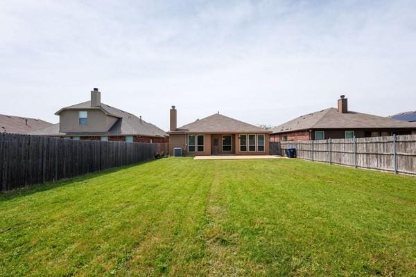 1300 Woodbine Cliff Dr, Fort Worth, TX 76179 - rear view of house with a patio area
