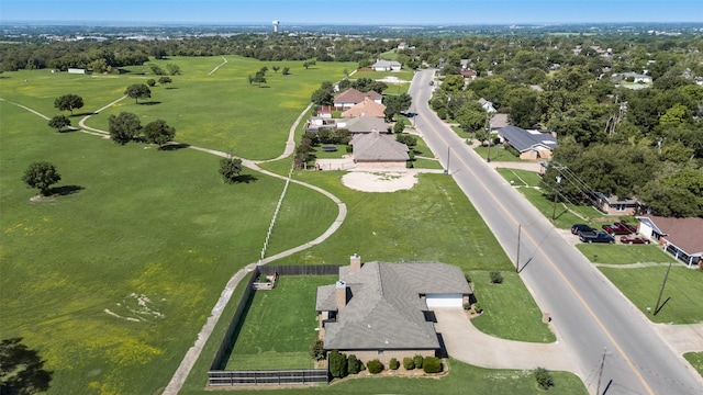407 W Park Ave, Weatherford, TX 76086 - aerial view of property and surrounding area with a tree filled landscape