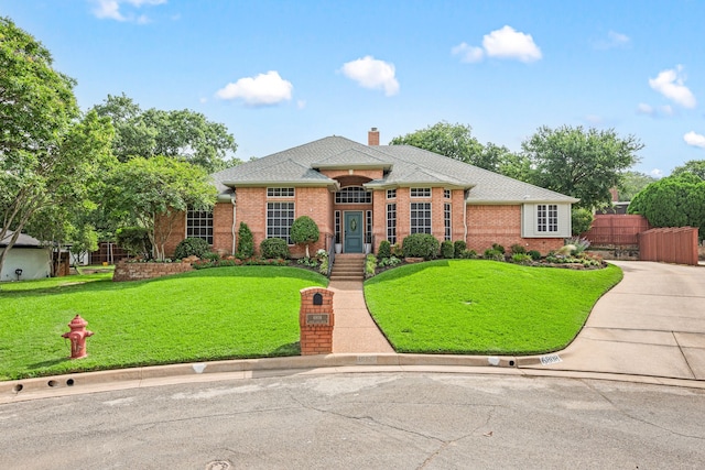 6808 N Oaks Dr, North Richland Hills, TX 76182 - view of front of property with brick siding, a chimney, and a shingled roof