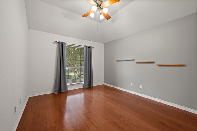 6808 N Oaks Dr, North Richland Hills, TX 76182 - spare room with wood finished floors, ceiling fan, baseboards, and lofted ceiling